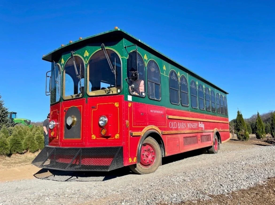 Red and green trolley at Frosty’s Choose & Cut