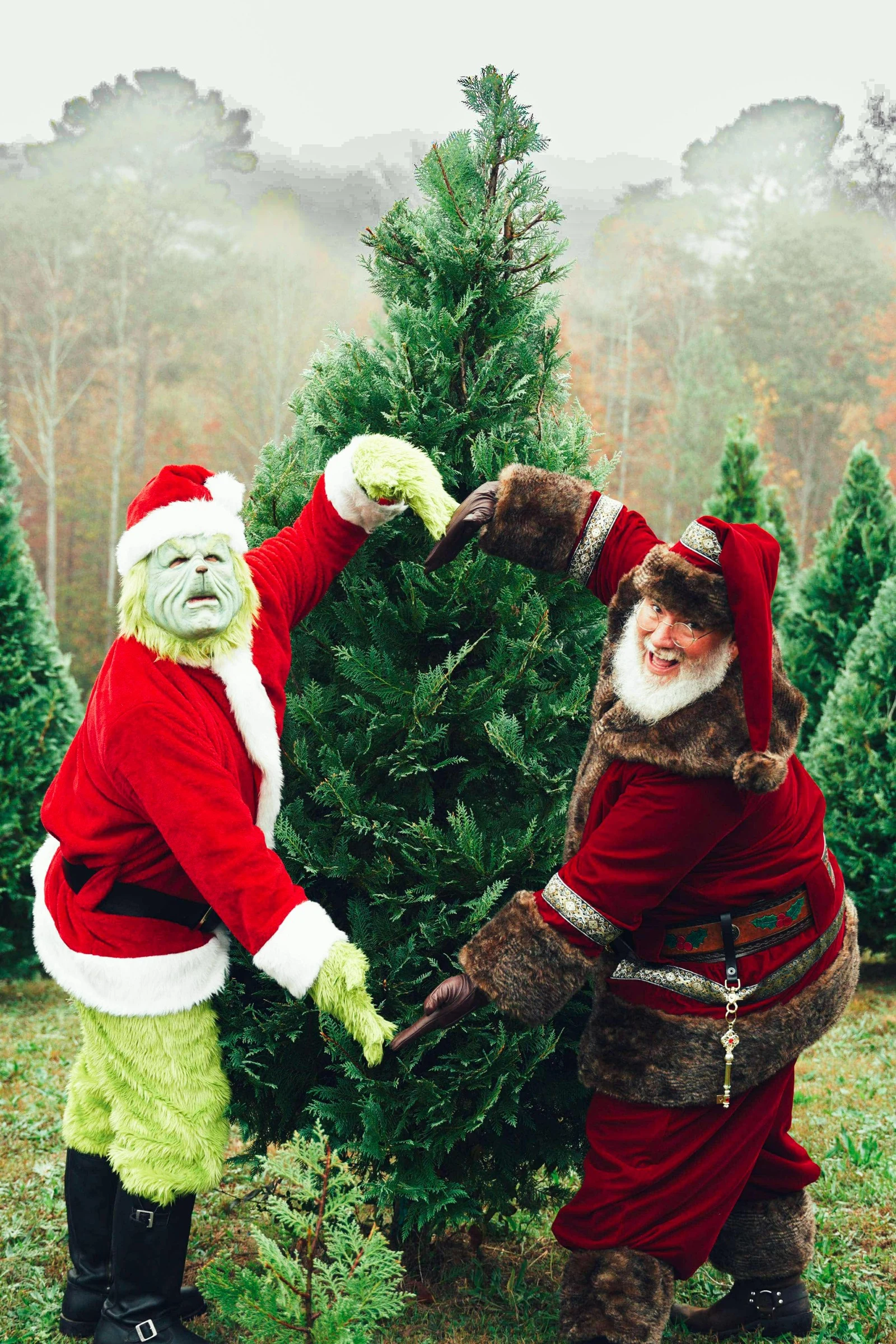 Santa and the Grinch beside a cypress tree at Moss Family Christmas Tree Farm.