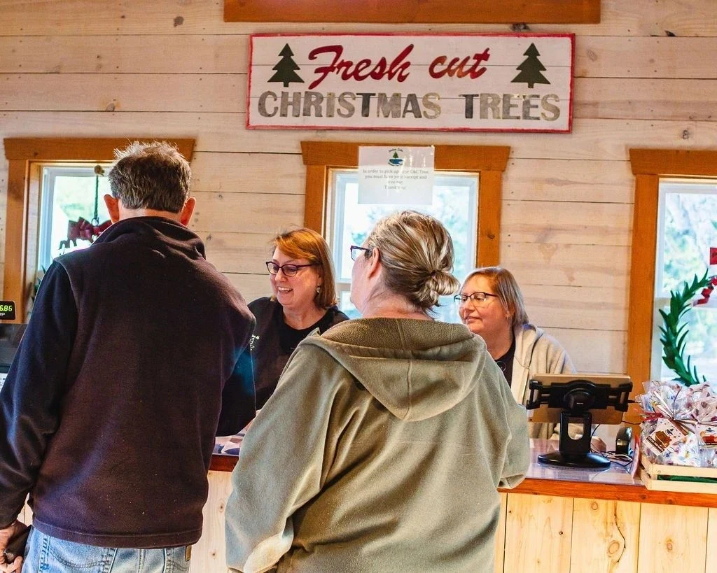 Visitors at the Jordan Lake farm shop counter